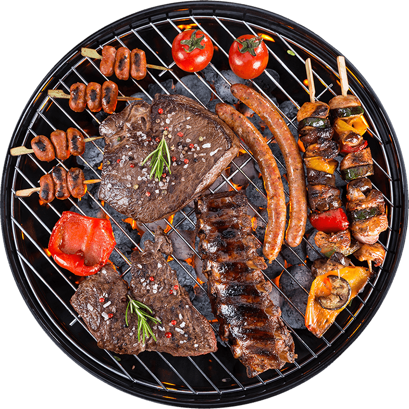 Assorted grilled meats, sausages, and skewers on a charcoal barbecue